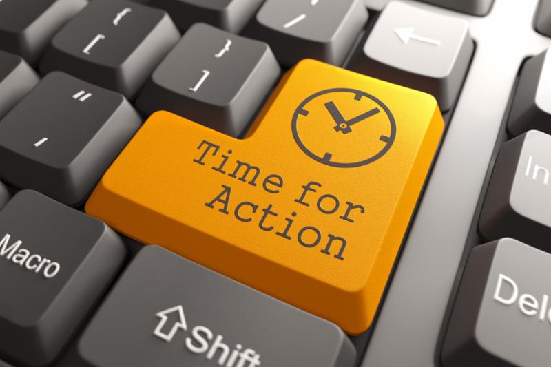 Computer Keyboard with a large yellow key that says "Time for Action"