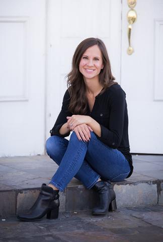 Photo of author Mary Kubica, Caucasian woman with shoulder-length brown hair, wearing blue jeans and a black shirt